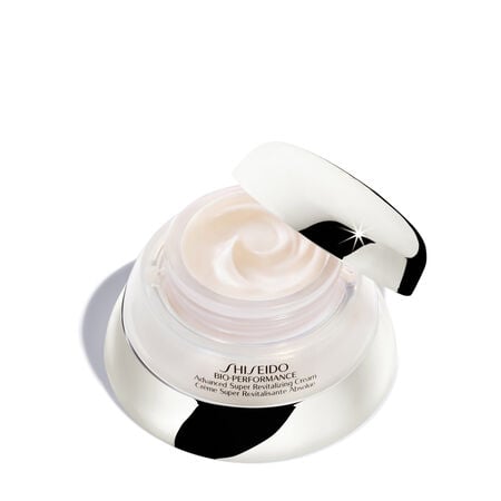 "A  round, silver-colored jar of Shiseido Bio-Performance Advanced Super Revitalizing Cream. The closed jar features the Shiseido logo and the product name. "